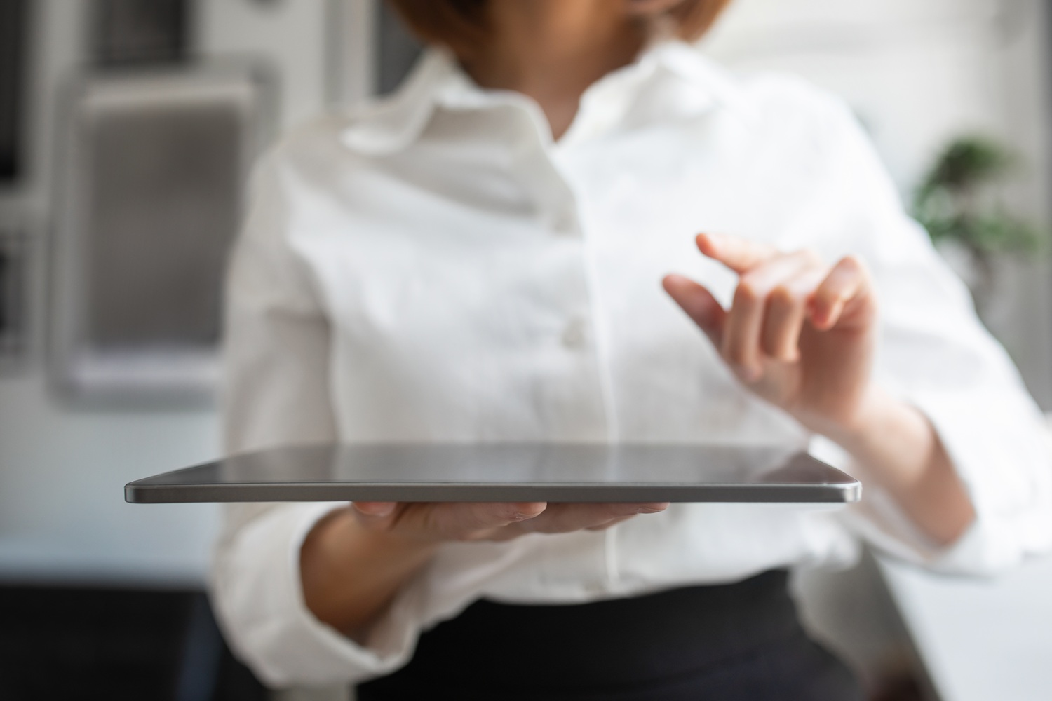 Artificial Intelligence System. Businesswoman Holding Digital Tablet And Pointing Finger Or Pressing Invisible Button - FV Almeida Prestação de Serviços Contábeis